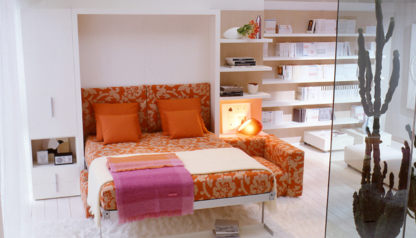 Hideaway bed in sunny space with orange highlights in upholstery