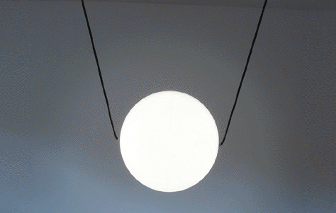 Johannes Hermann suspended round light fixture