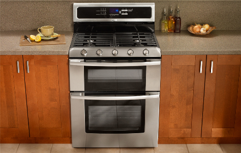 Gold Freestanding Double Oven. Manufactured by Whirlpool.