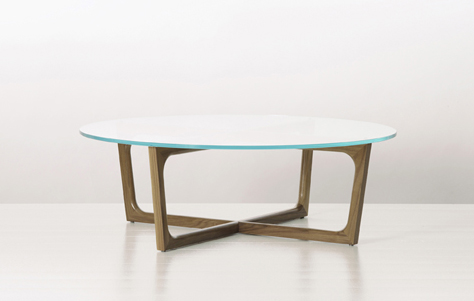Loophole 42” Round Coffee Table in Walnut. Designed by Jay Chapman. Manufactured by Geiger.