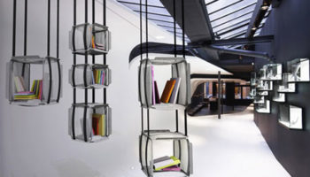 Adrien De Melo's Upside Down: A Column of Suspended Books