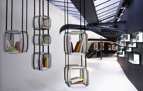 Adrien De Melo's Upside Down: A Column of Suspended Books