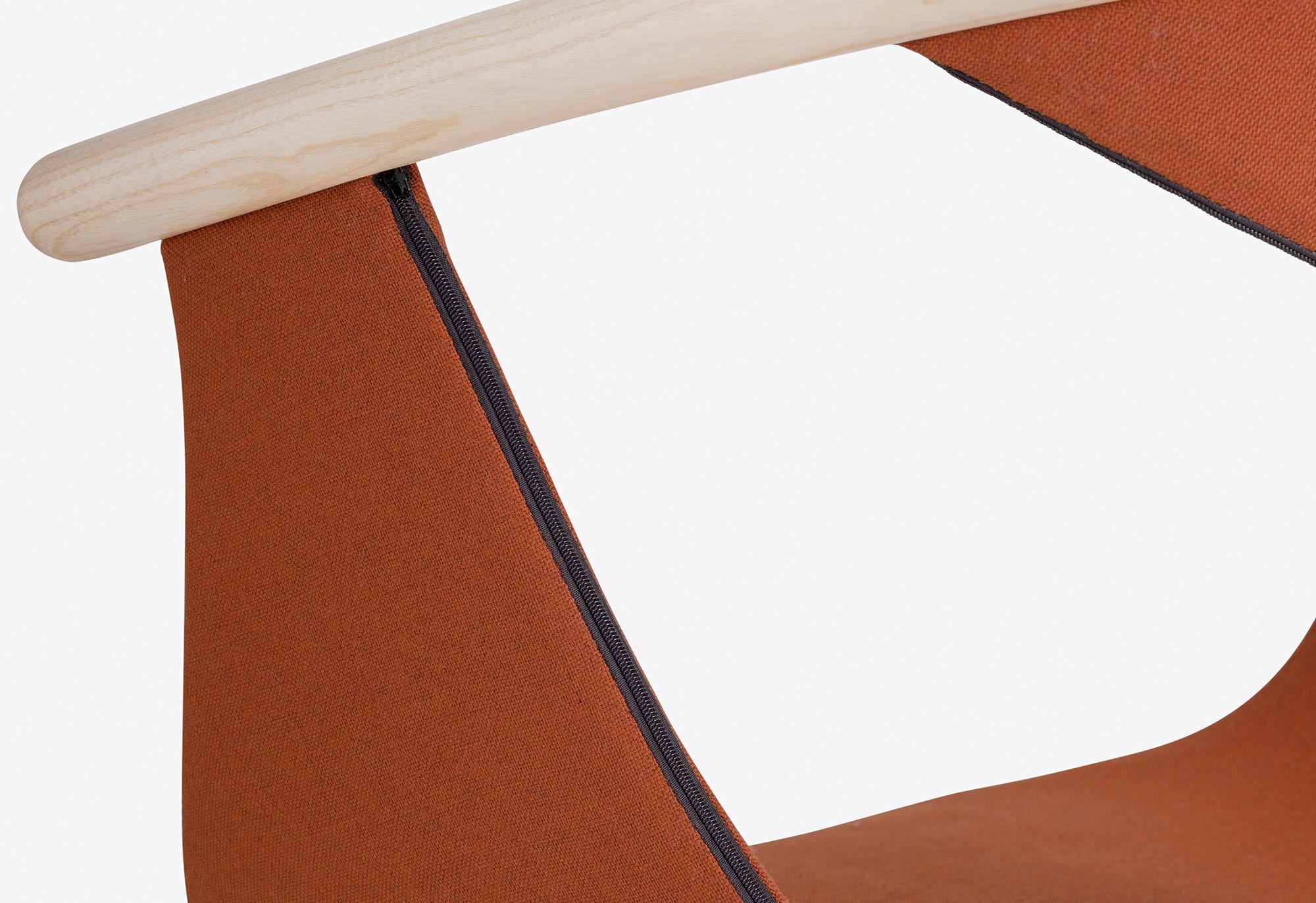 Detail of Interra Designs Fox Chair in rust-colored upholstery