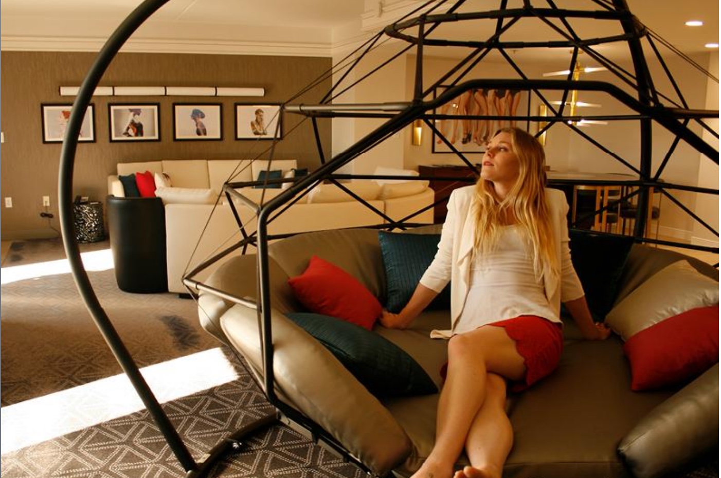 Large Zome indoors with woman sitting inside