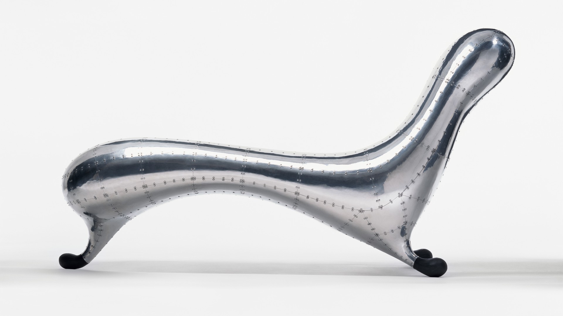 airplane-inspired futuristic metal lounge chair