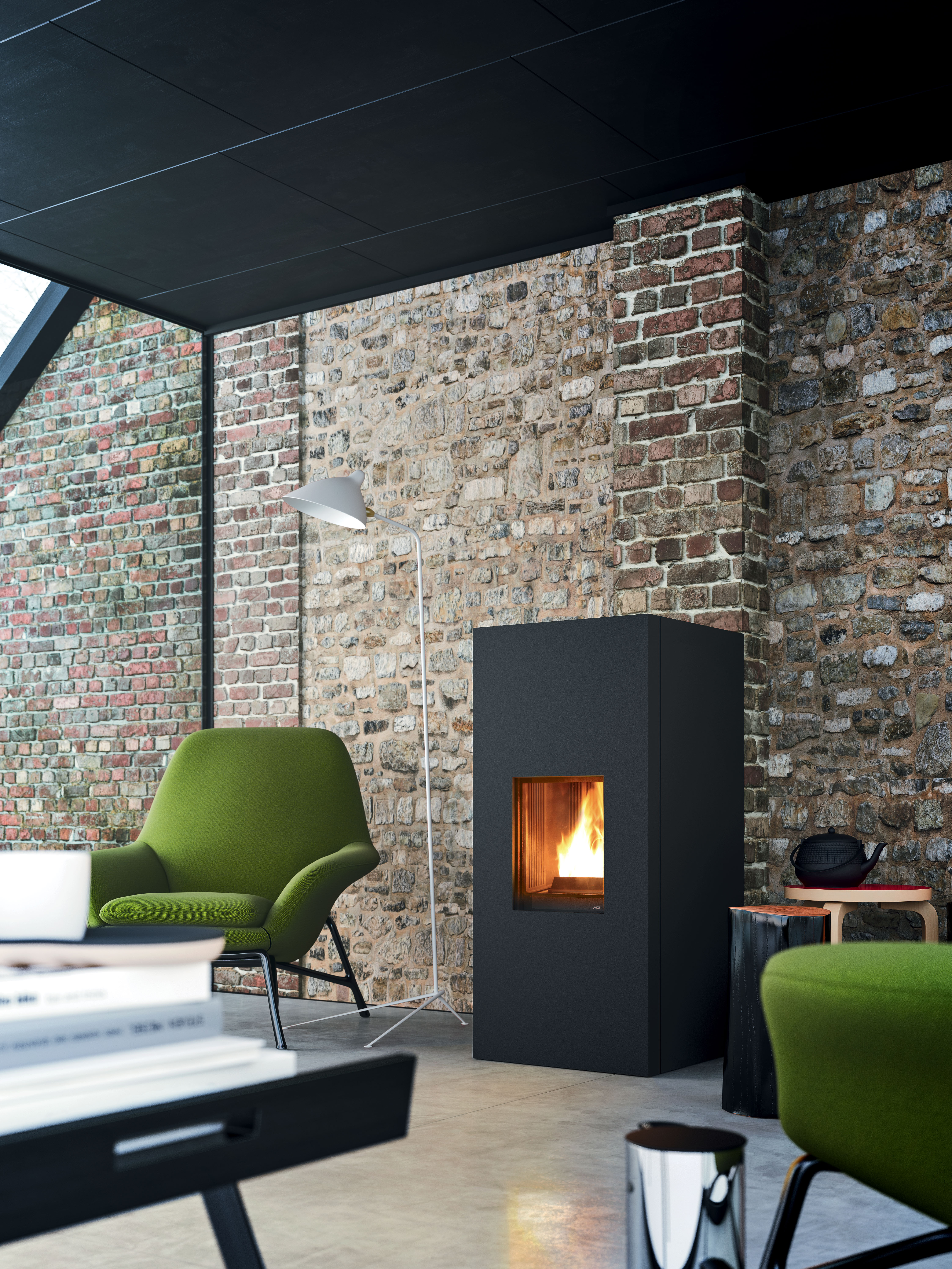 Black MCZ Wood BurningStove on patio of rural house