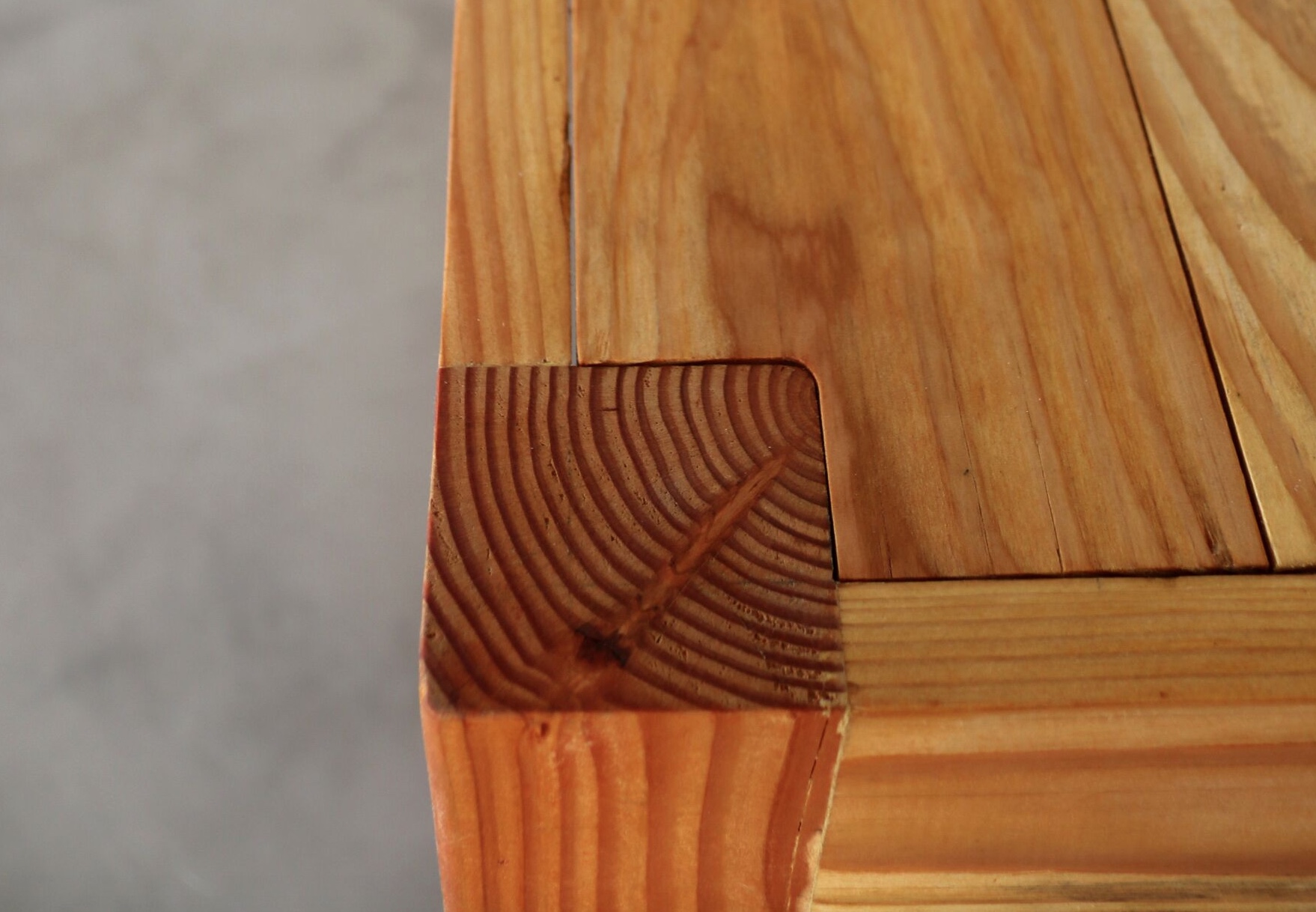 No Throw Doug Table close-up with detail of leg joint