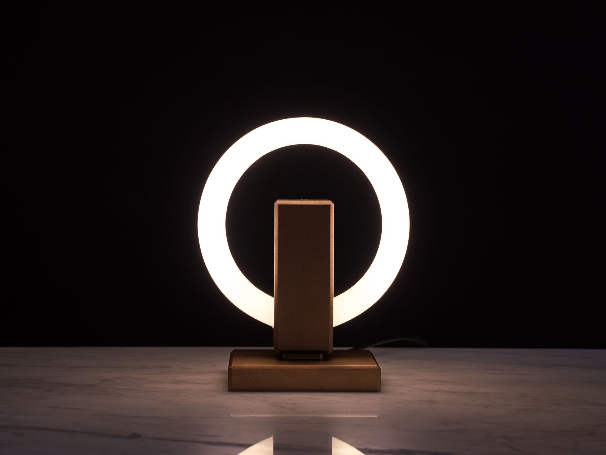 Karice Olah Table Lamp in darkened room