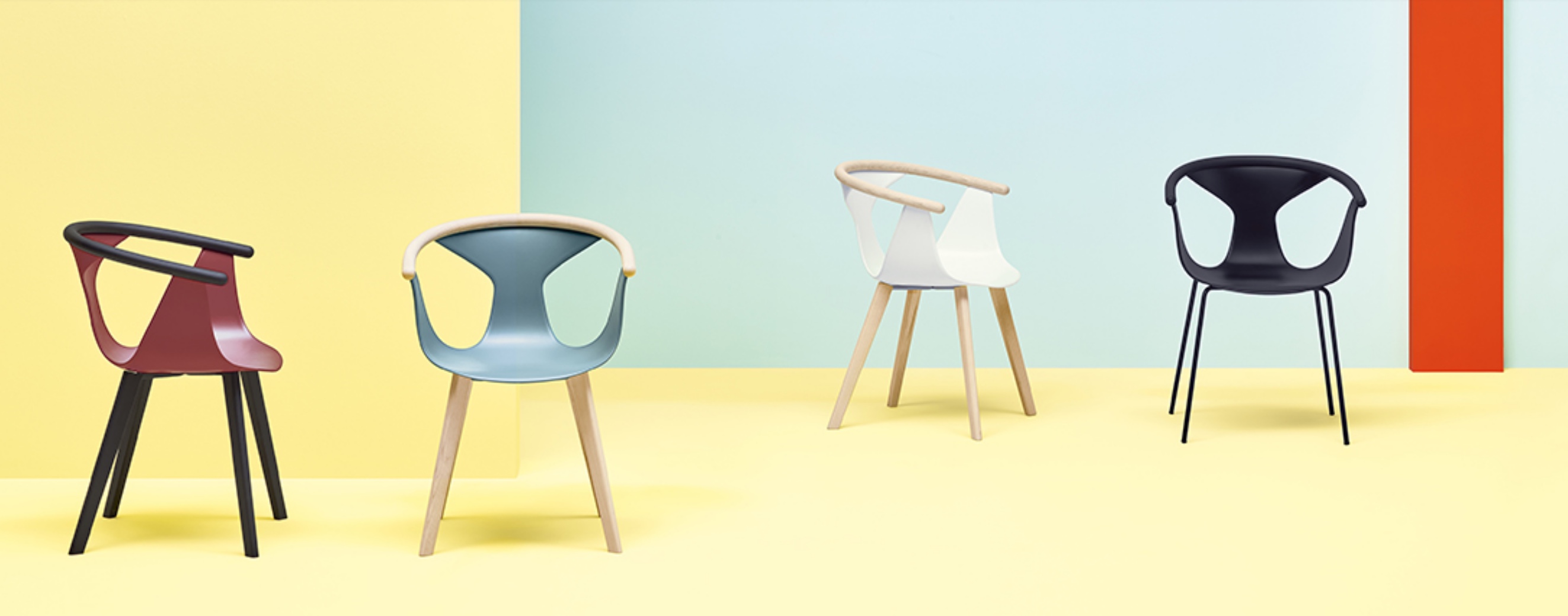 Image of four Pedrali Fox Stackable Guest Chairs, two front views and two side views in four colors: rust, light blue, white, and black