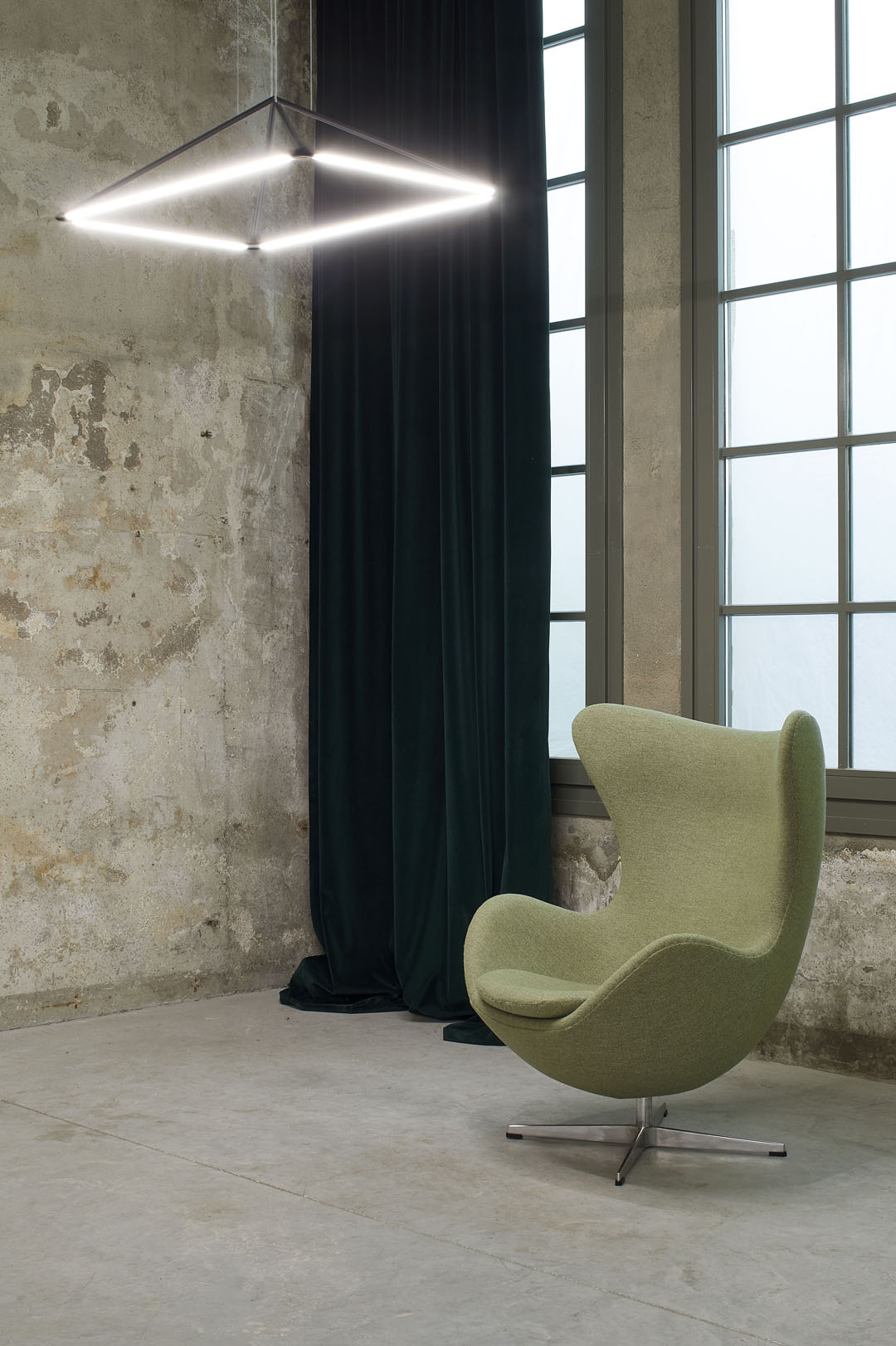 LEDS C4 TUBS Downlight in loft with green swan chair