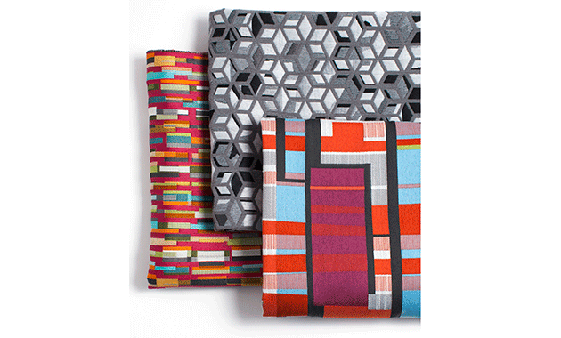 three fabric swatches with geometric shapes in bold colors