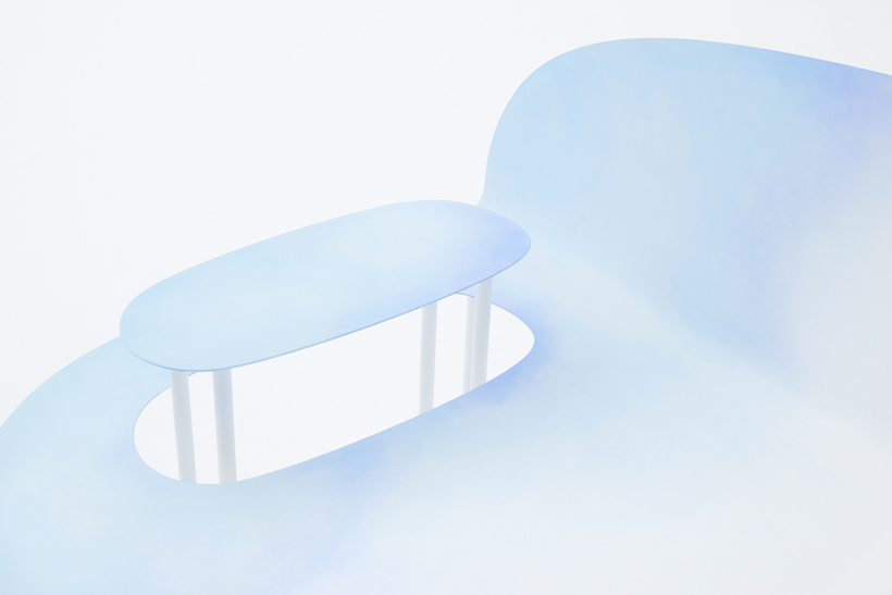 detail of hand-painted metal bench in blue and white
