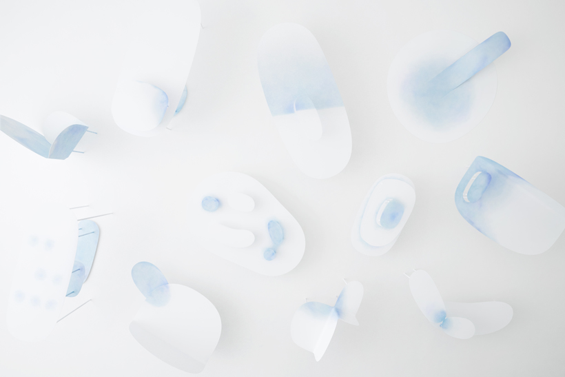 arial view of metal furniture collection hand-painted in watercolor blue and white