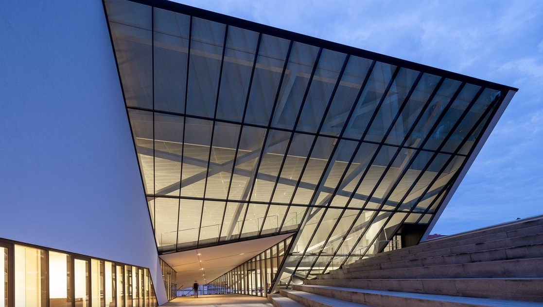 view of angled glass facade on museum buildingg