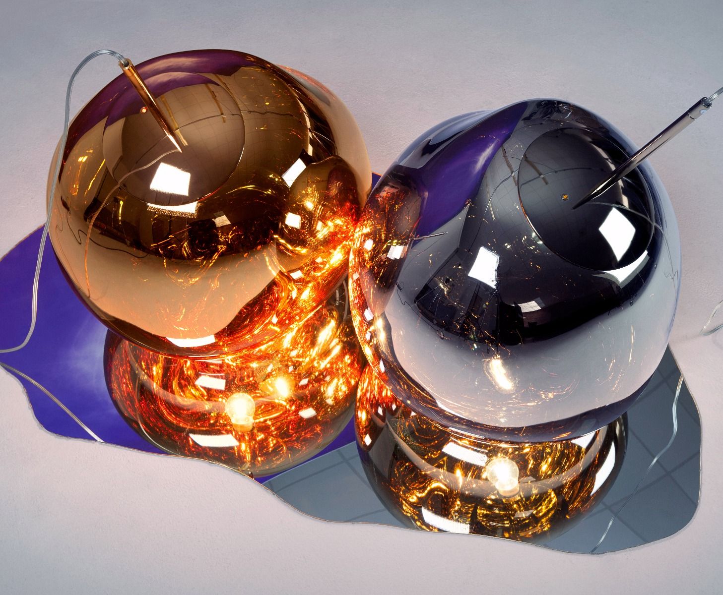 Tom Dixon Melt Pendant in orange, rust, and purple