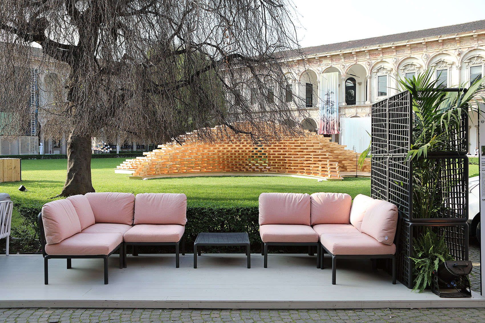Komodo Modular Outdoor Sofa Pink cushions on black frame