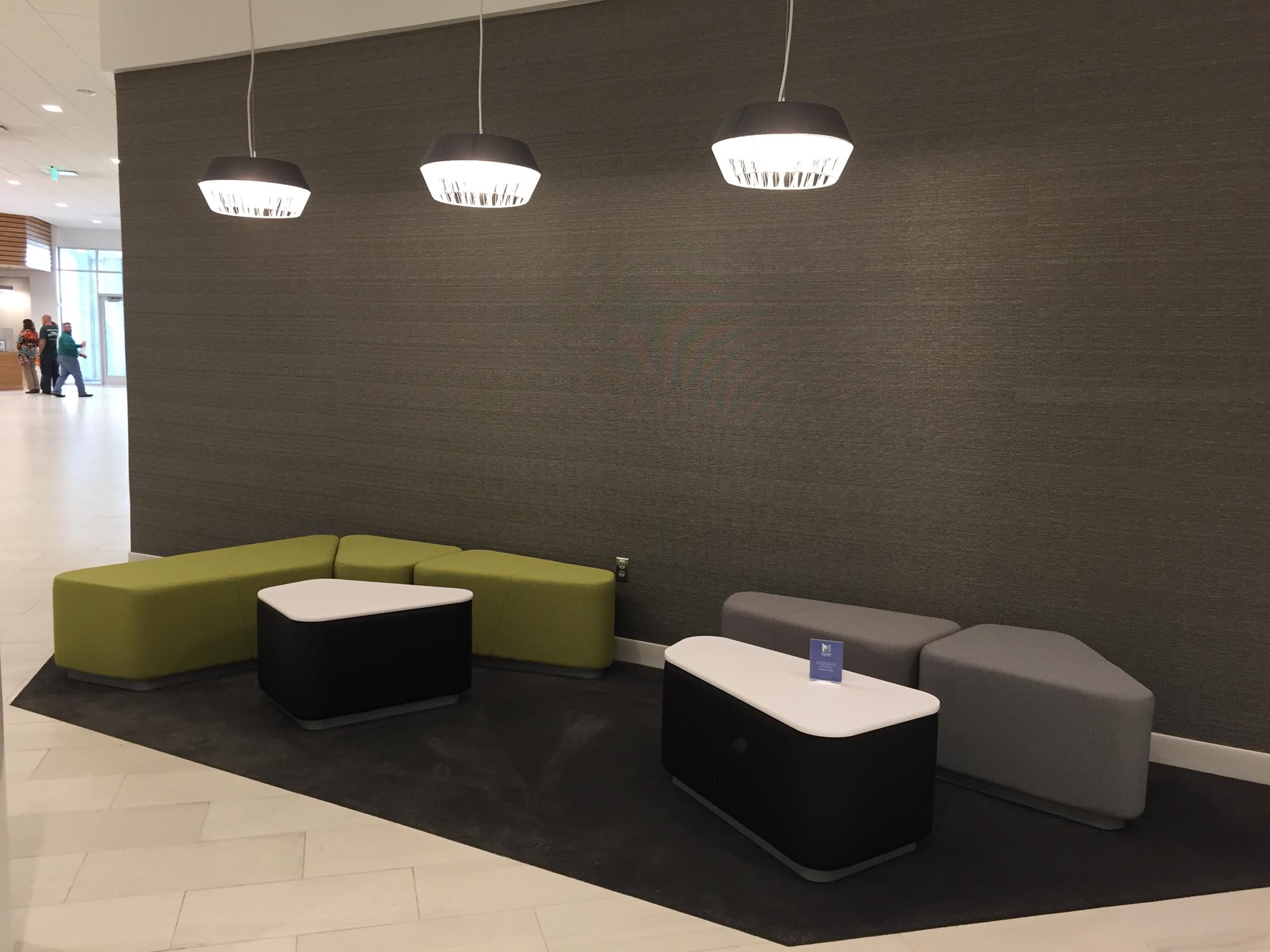 Bouty's Modular Lounge gray and green against wall