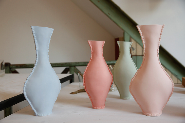 matte cermaic vase with soft, cloth-like appearance