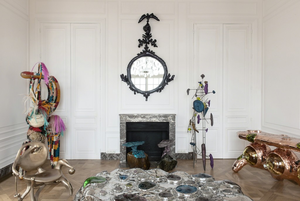 Backbend Starfish coffee table with other furnishings by Misha Kahn