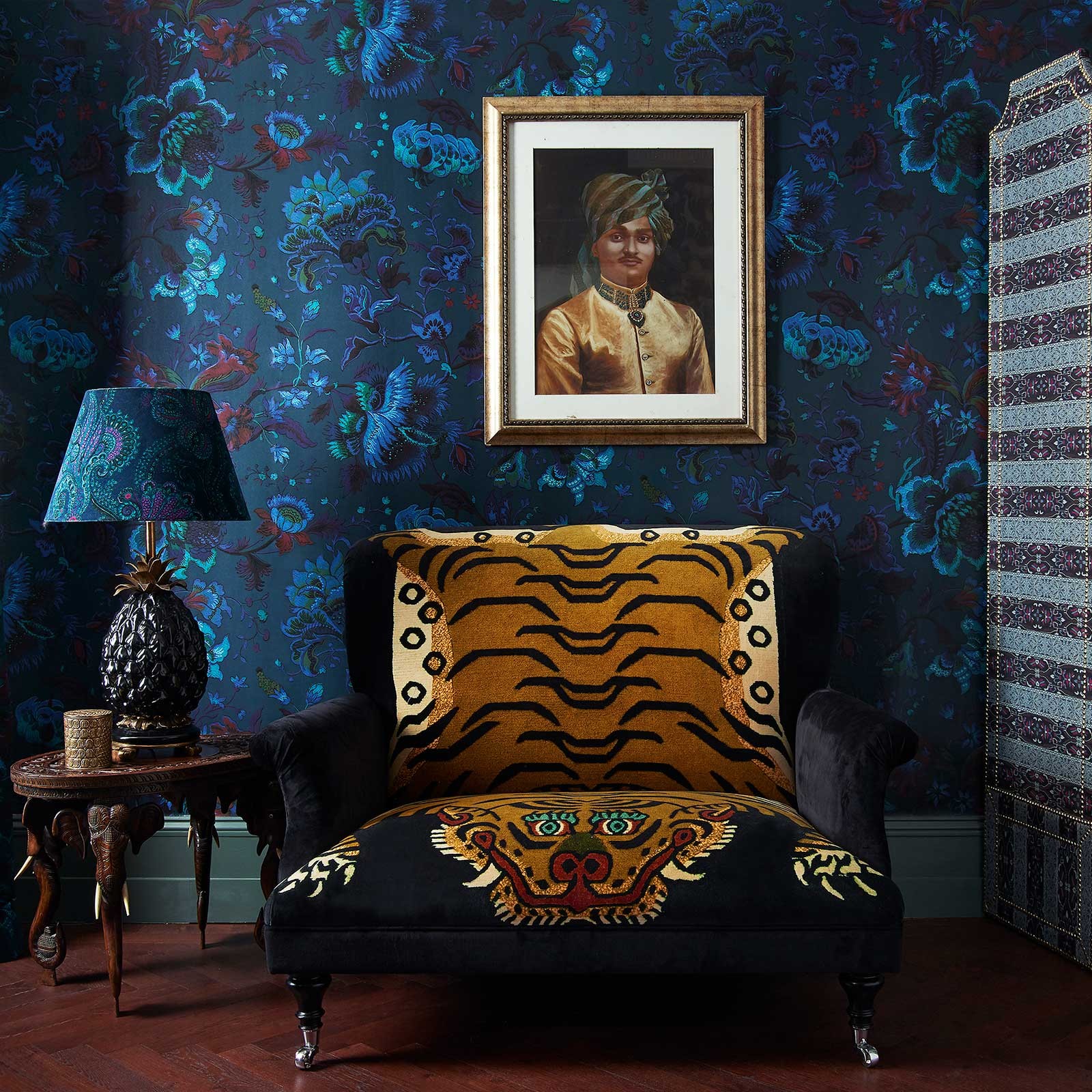 House of Hackney's Majorelle Wallpaper petrol with tiger print lounge chair