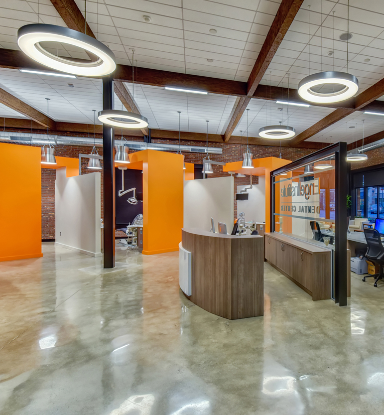 Impact Lighting's wht.wal pendant in dental office four lights