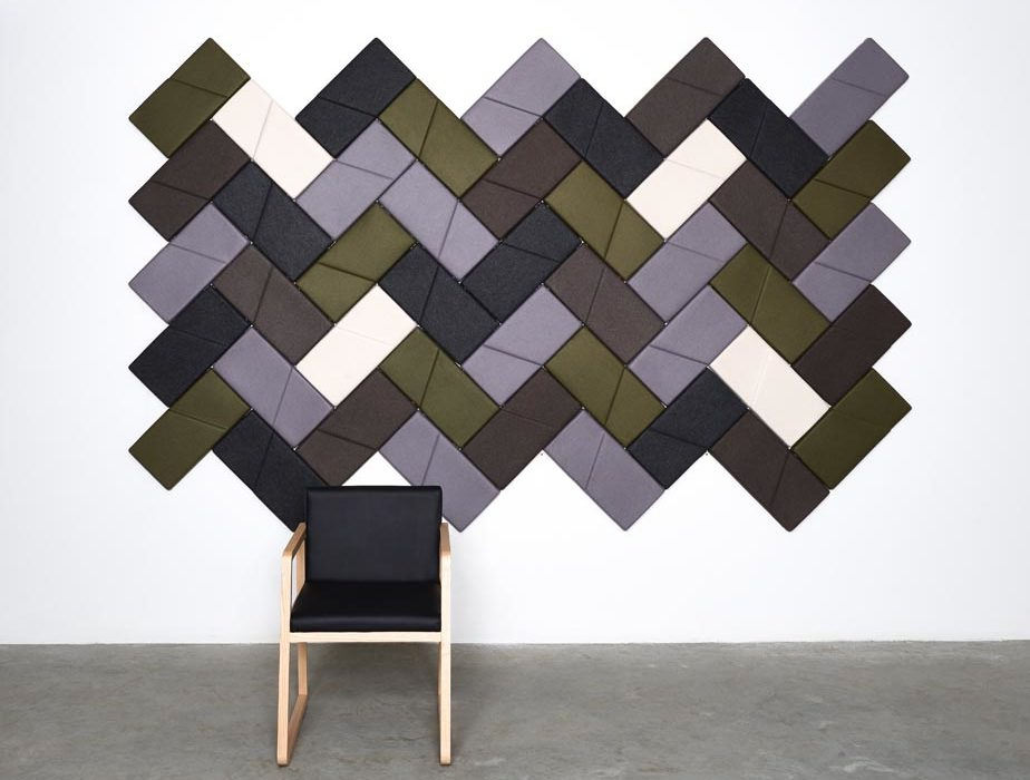 white wall with rectangular acoustical tiles