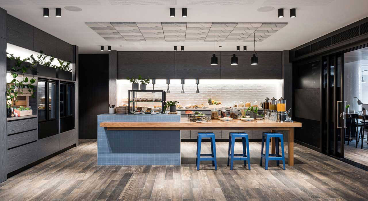 hotel dining area with acoustical ceiling tiles