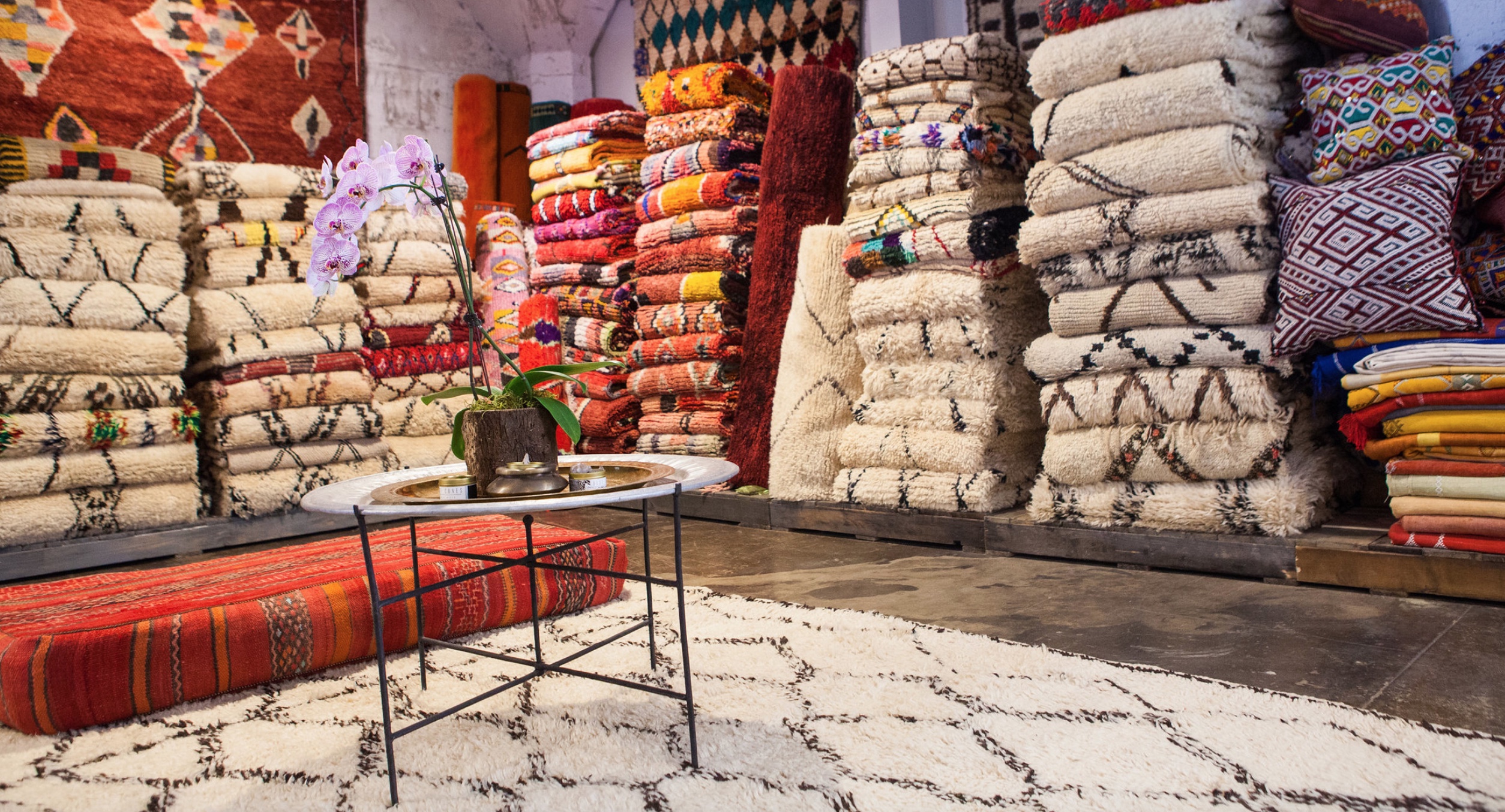 Kechmara Rugs Stacked in showroom