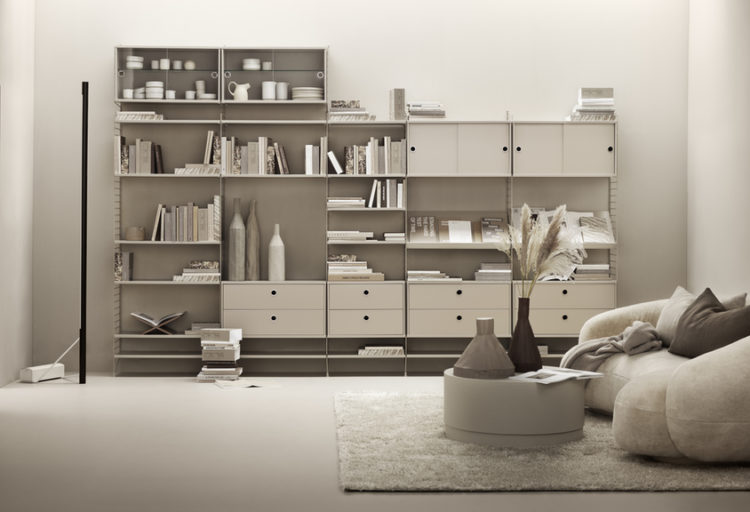 minimalistic beige living room with metal wall system in beige