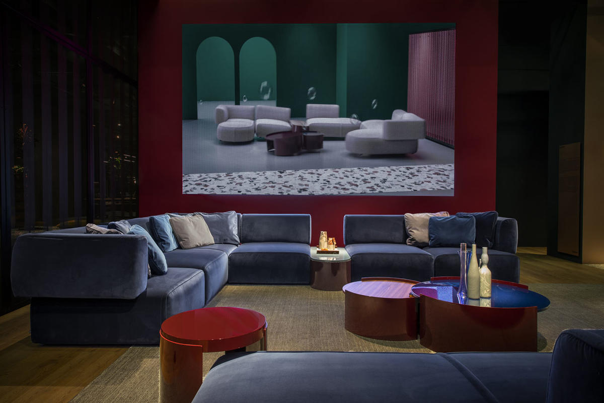 purple velvet modular sofa in jewel-toned living room