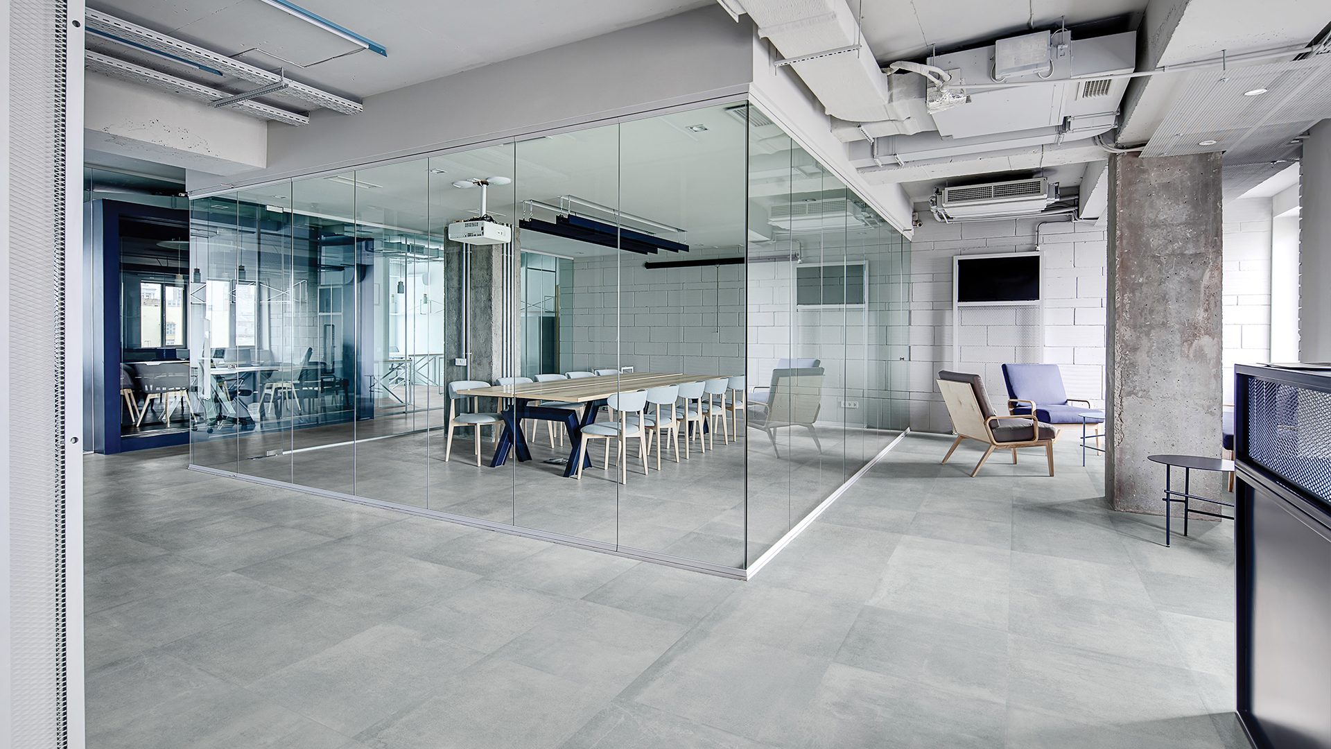 Anatolia Industria Collection Lithium color in conference room setting