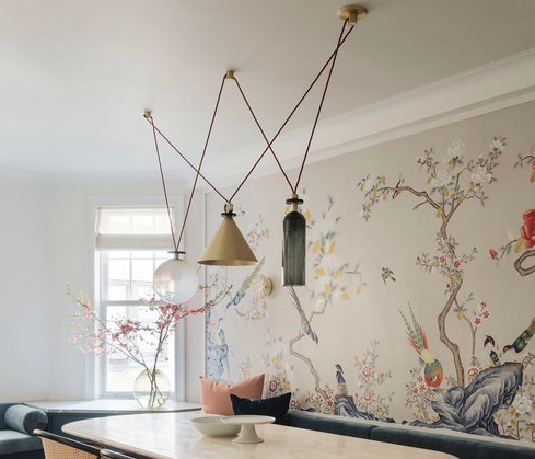 dining room with modular chandelier above table