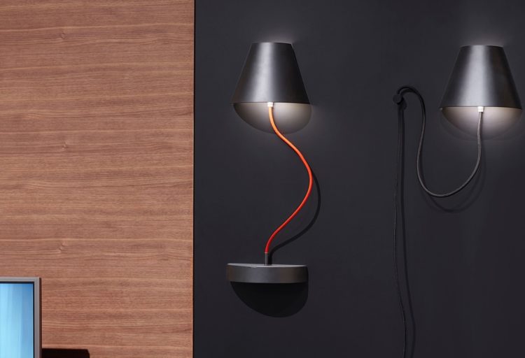Ronda Design Lapilla Magnetic Lamp two lamps next to wood paneling