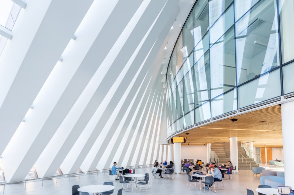 Isenberg School of Management Interior beneath pillars and student commons
