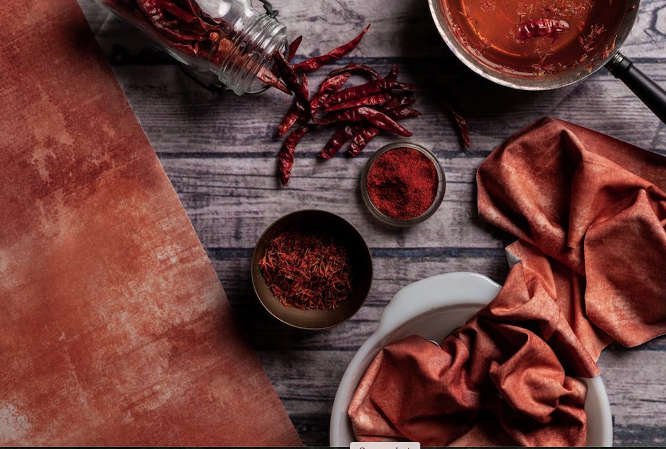 orange acid wash textile with chilis and spices