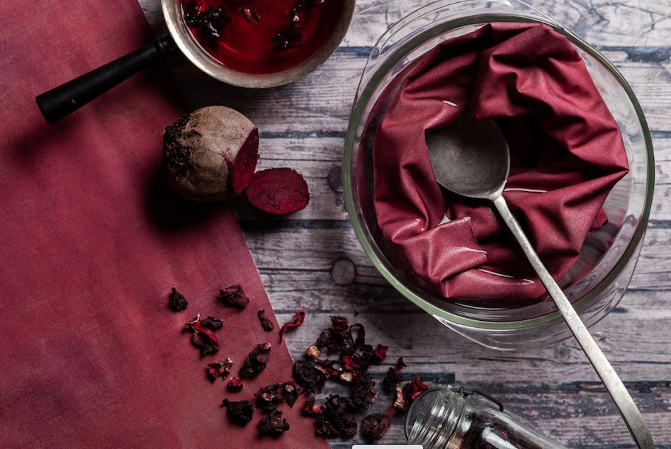wine-colored fabric with beets and spices