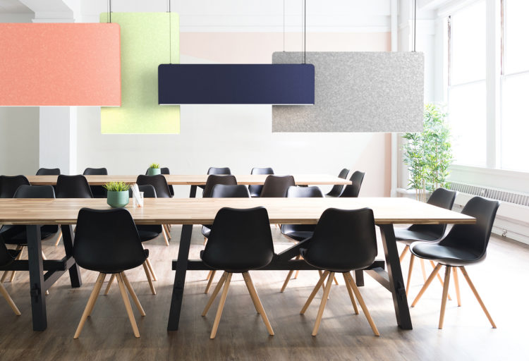 dining table with acoustical linear lighting overhead