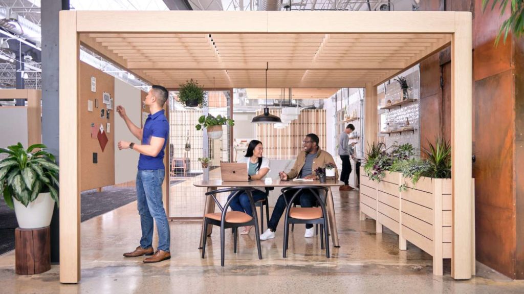 OFS Obeya with table, whiteboards, and pegboard