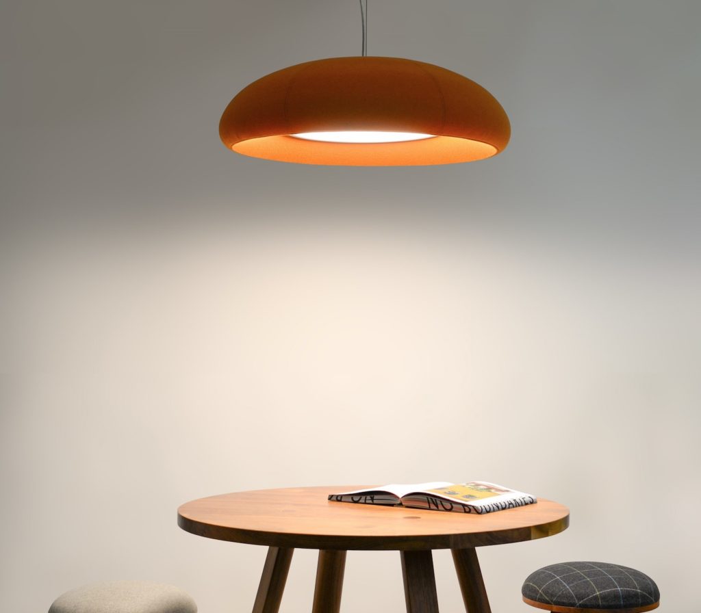BuzziSpace BuzziDome orange light above small table