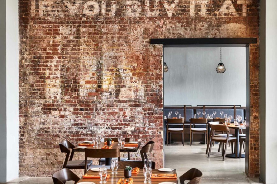 Bristol Hotel interior of restaurant with exposed brick wall