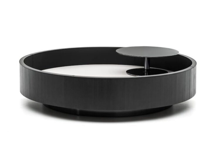 round, swivel lacquered wood coffee table with interior storage