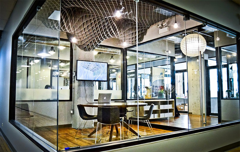 ezoBord Acoustical Net in brown installed on ceiling of privacy room in office