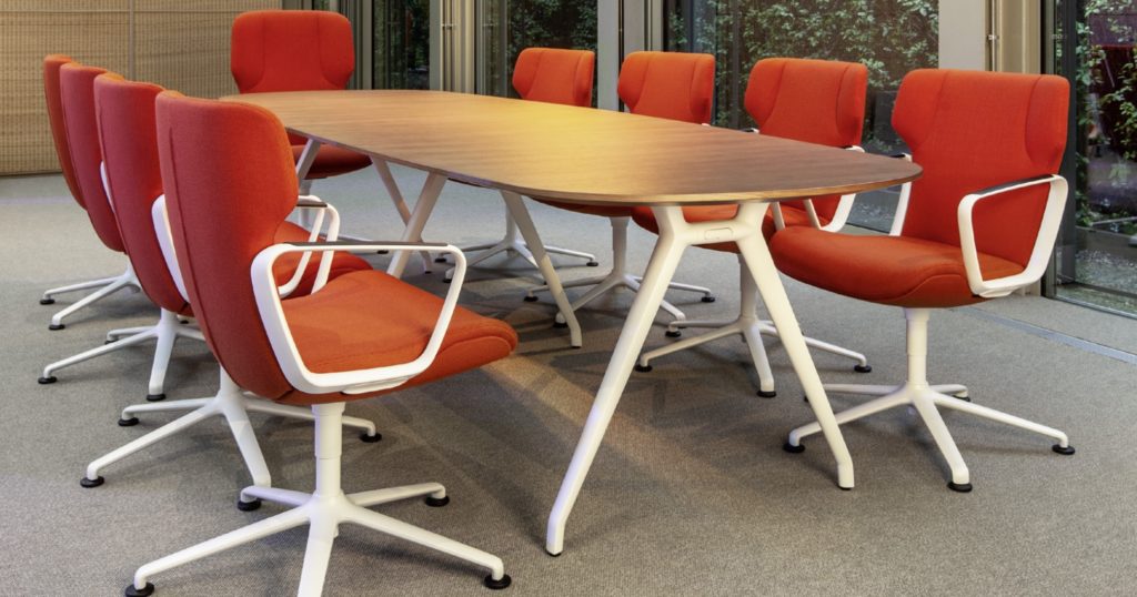 Wilkhahn Intra Chair several chairs around work table with orange upholstery