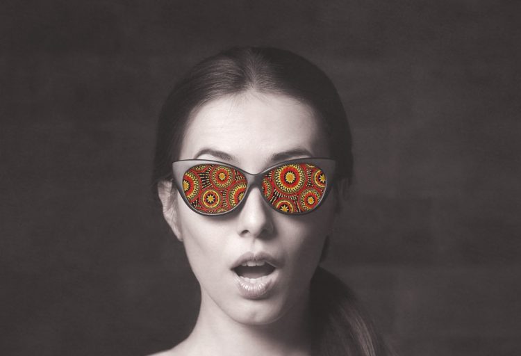 Architex Some Like it Mod Good Day Sunshine pattern in sunglasses worn by model