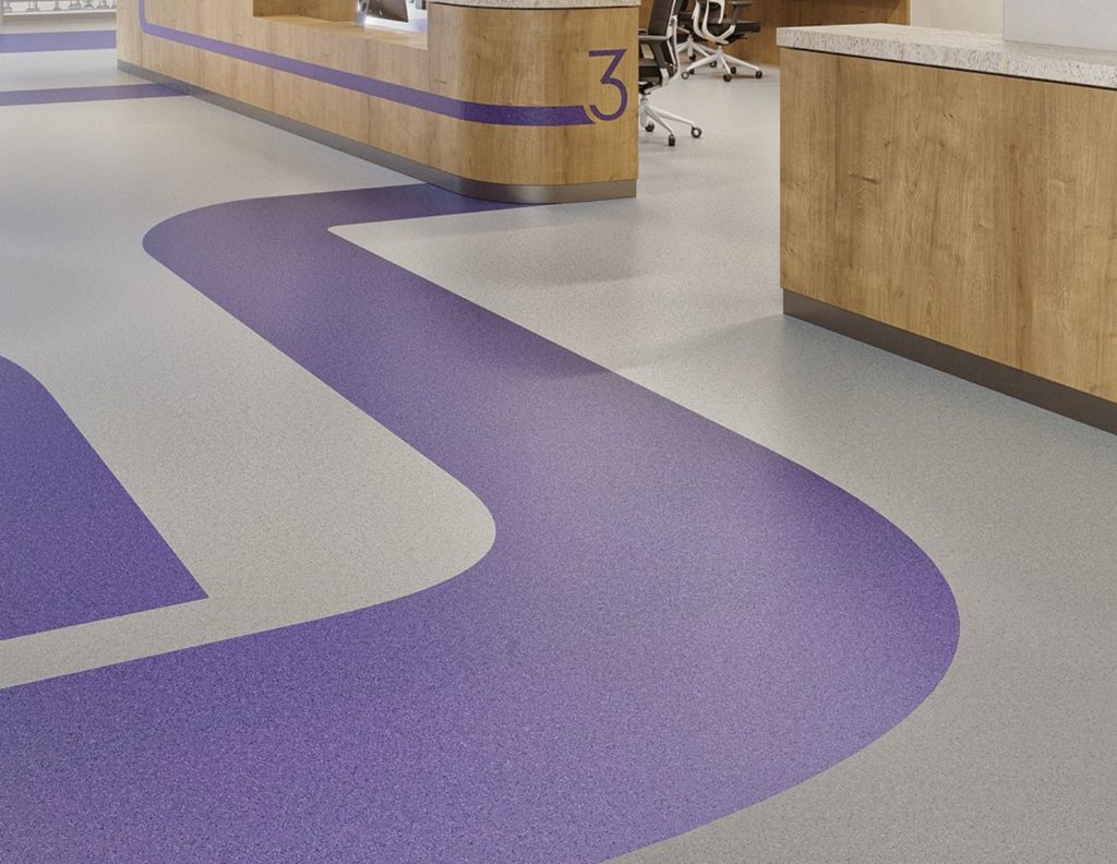 Mohawk Group True Hues Collection of rubber flooring gray and purple in curved pattern