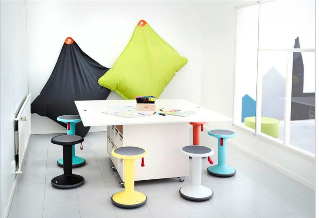 Up Stool several stools around white table in casual office