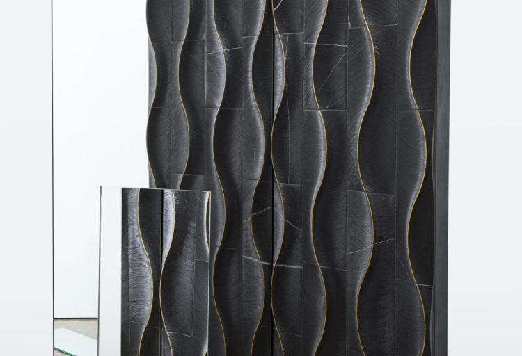 Zephyr Artistic Tile large wall of tile displayed adjacent to mirrors