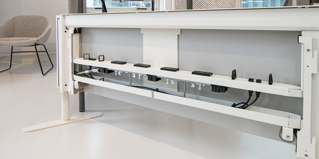 Watson C9 interior view of rail system with data and power conduits