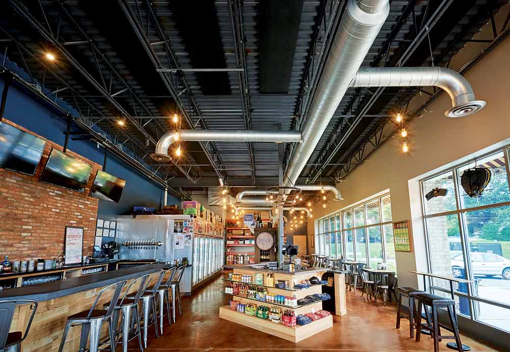 Armstrong Ceiling and Wall Solutions Invisacoustics panels black in restaurant
