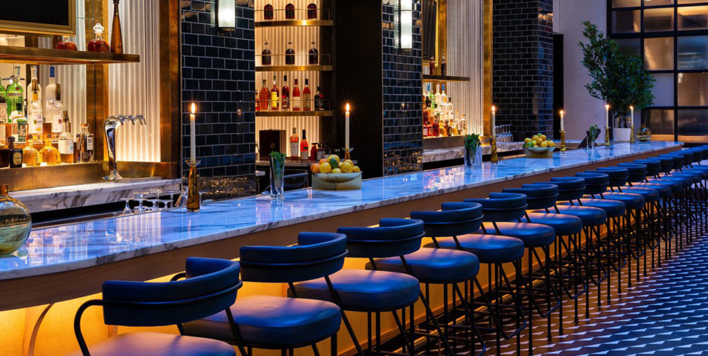 Demar Leather Nashville Dream hotel bar with many bar chairs in blue upholstered leather